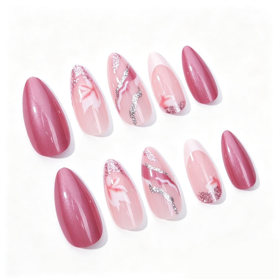 Kunstnagelset mit floralen Mustern und Glitzerelementen Brehn