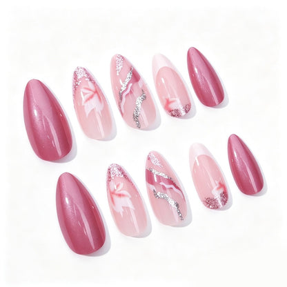 Kunstnagelset mit floralen Mustern und Glitzerelementen Brehn