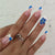 Dekoratives Blumennagelset zum Aufkleben Brehn