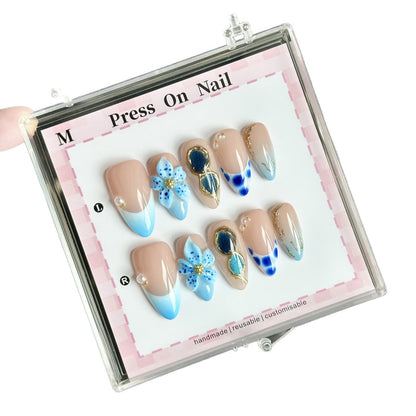 Künstlerische Press-On-Nagel-Set mit floralem und gradientem Design