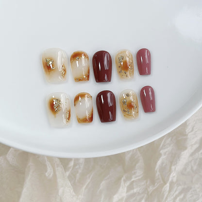 Künstlerisches Press-On Nagelkunstset mit Herz- und himmlischen Designs