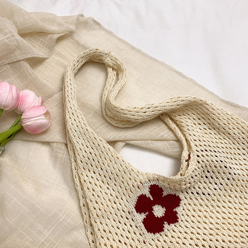Künstlerische gehäkelte florale Tragetasche