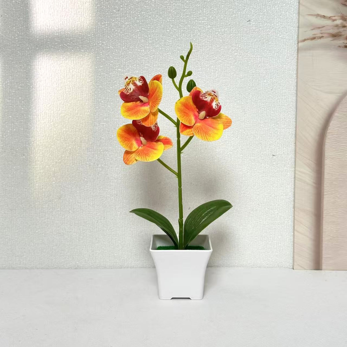 Künstliche Orchideenarrangements für Wohn- und Bürodeko