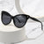 Damen modische Cat-Eye Sonnenbrille mit transparentem Rahmen und blauen Gläsern Brehn
