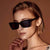 Damen modische Sonnenbrille mit breitem Rahmen und markantem Design Brehn