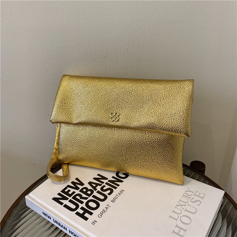 Elegante Texturierte Handgelenk-Clutch Brehn