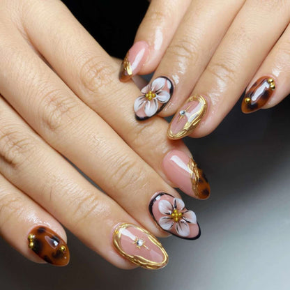 Künstlerische Floral- und Edelstein-Press-On-Nägel