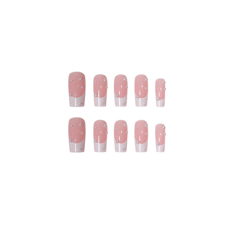 Kunstnagelset mit exquisiten Perlenakzenten und transparentem Design Brehn