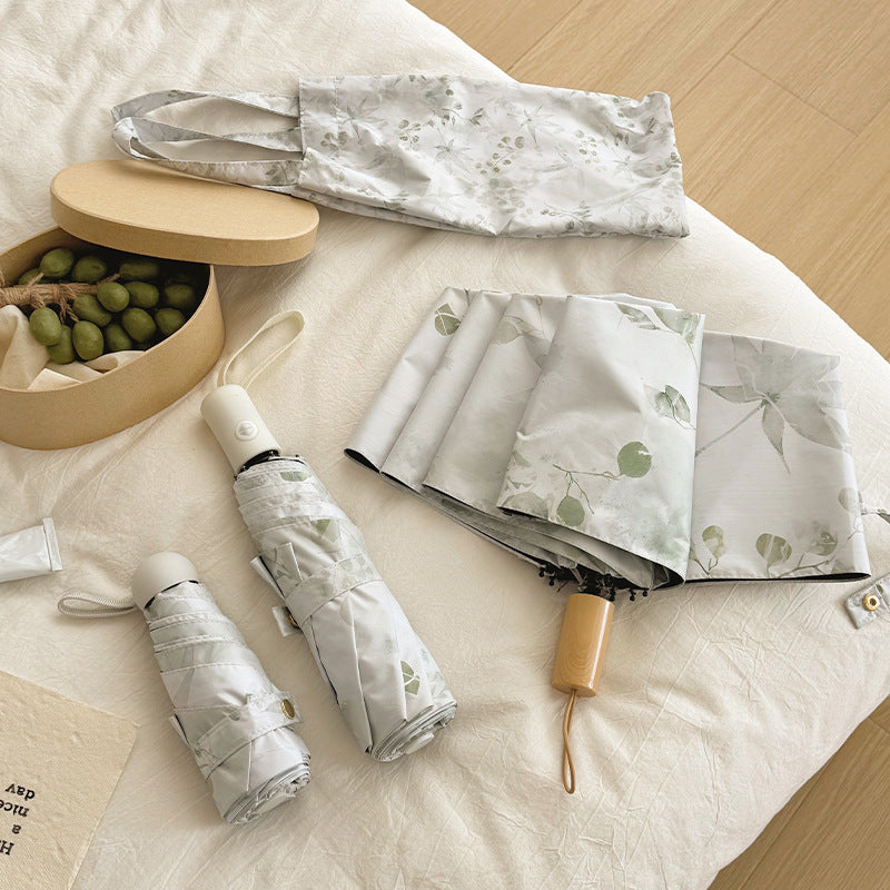 Damen Faltbarer Regenschirm mit elegantem botanischem Muster Brehn