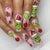 Künstliche Nagelspitzen mit festlichen Weihnachtsmotiven Brehn
