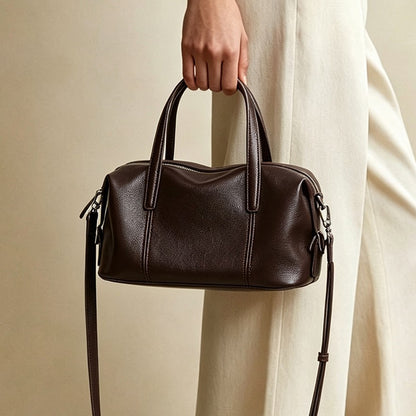 Strukturierte Fass-Top-Handle-Satchel mit abnehmbarem Crossbody-Gurt