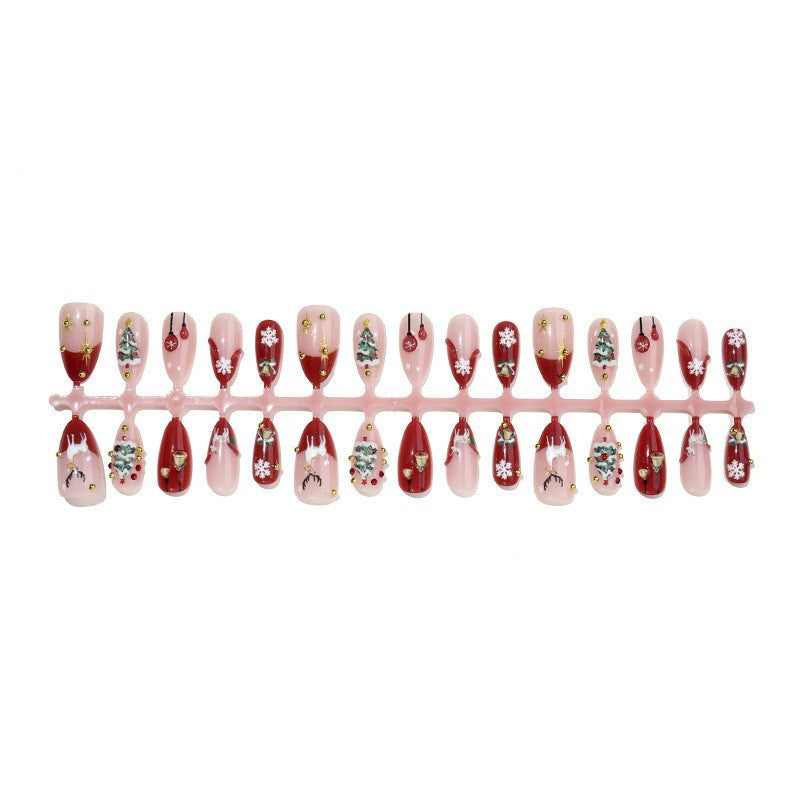 Kunstnagelset mit festlichen Motiven und Glitzerelementen Brehn