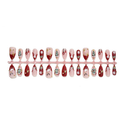 Kunstnagelset mit festlichen Motiven und Glitzerelementen Brehn