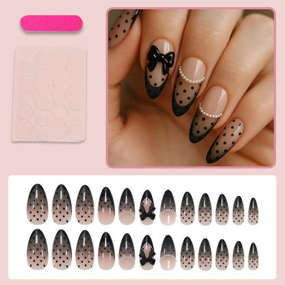 Kunstnagelset mit elegantem Punkt- und Schleifenmuster Brehn