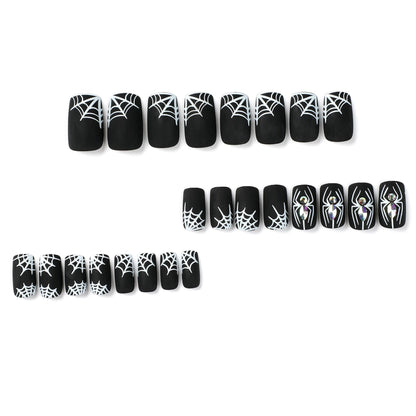 Kunstvolle Nagelverlängerungen mit Spinnen- und Spinnennetzdesign Brehn