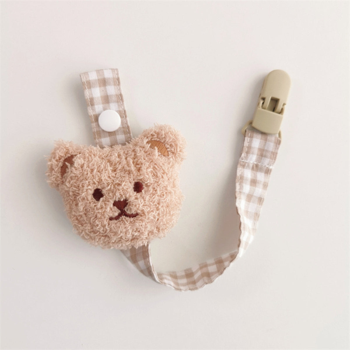 Blumenkleidungs-Schnullerclip mit Gingham-Baumwollgurt