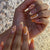 Kreatives Nagelset mit Blumen- und Fruchtverzierungen Brehn