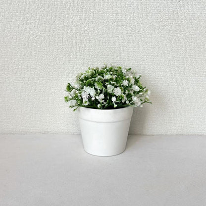 Miniatur Arrangement mit künstlichen Blumen im Topf