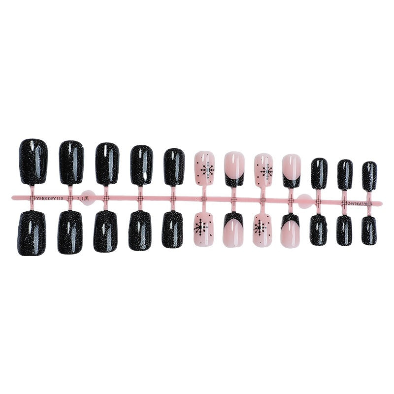 Kunstnagelset mit edlen Schwarz- und Rosé-Designs Brehn