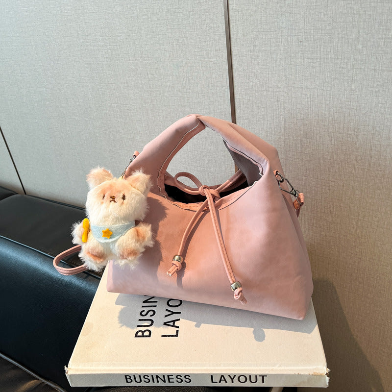 Stylische und funktionale Drawstring-Handtasche Brehn