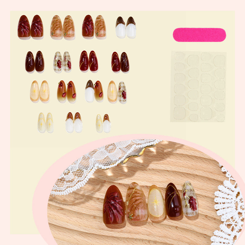 Premium dekorative Press-On Nagelset mit künstlerischen floralem Akzenten Brehn