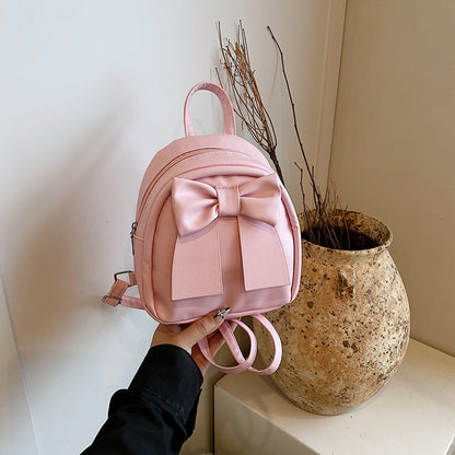 Bogenakzentierter Faux-Leder Mini-Rucksack