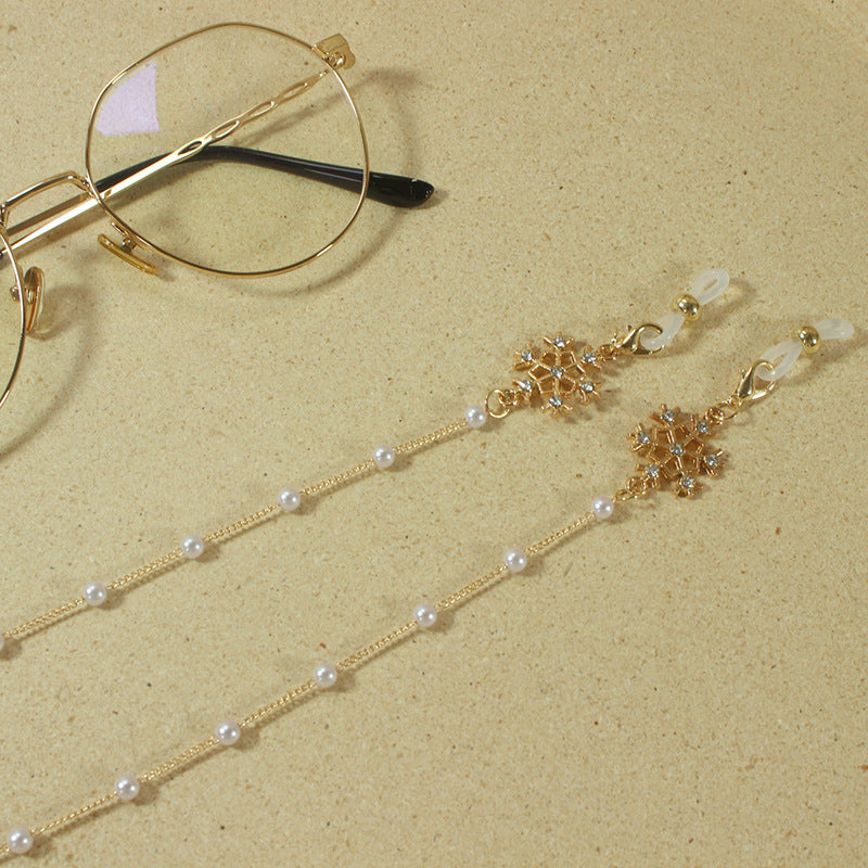 Elegante Brillenhalterkette mit Perlen und Schneeflockenanhänger Brehn