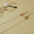 Elegante Brillenhalterkette mit Perlen und Schneeflockenanhänger Brehn