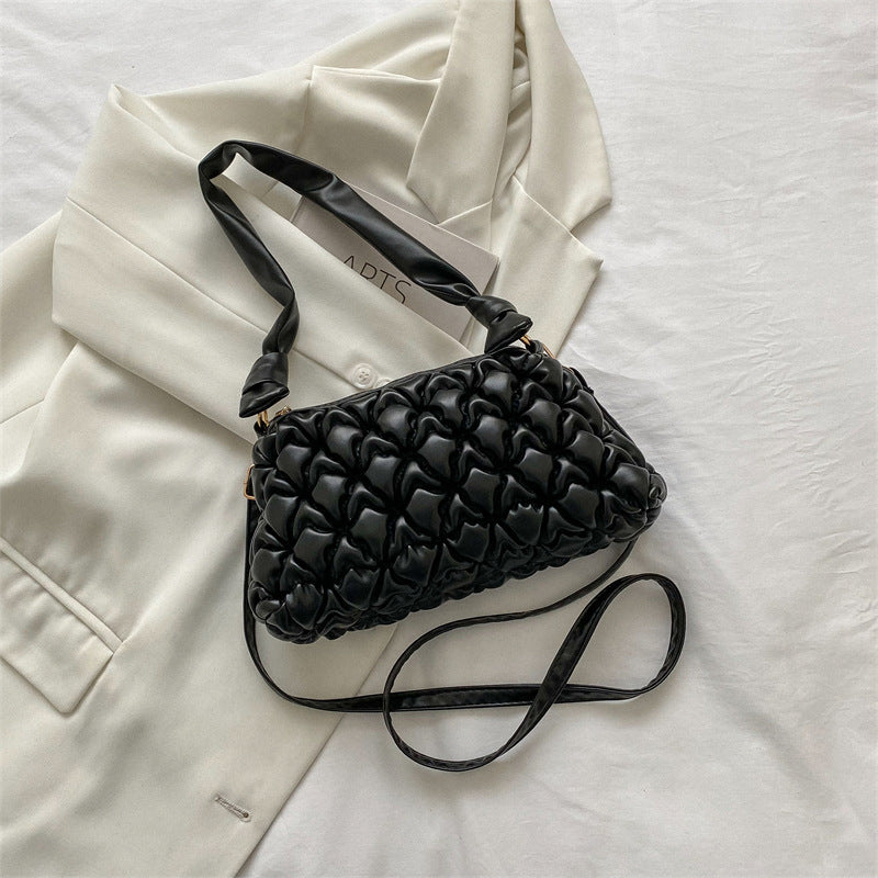 Elegante gepuffte Handtasche
