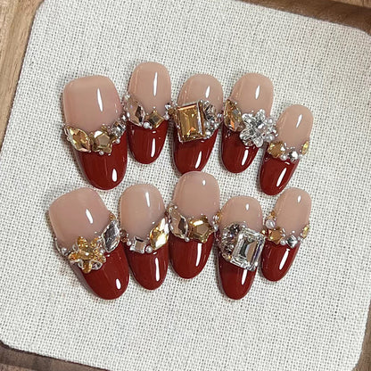 Elegantes Press-On-Nageldesign mit Strassakzenten Brehn