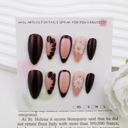 Kunstnagelset mit eleganten Blumenmustern und Glamour-Akzenten Brehn
