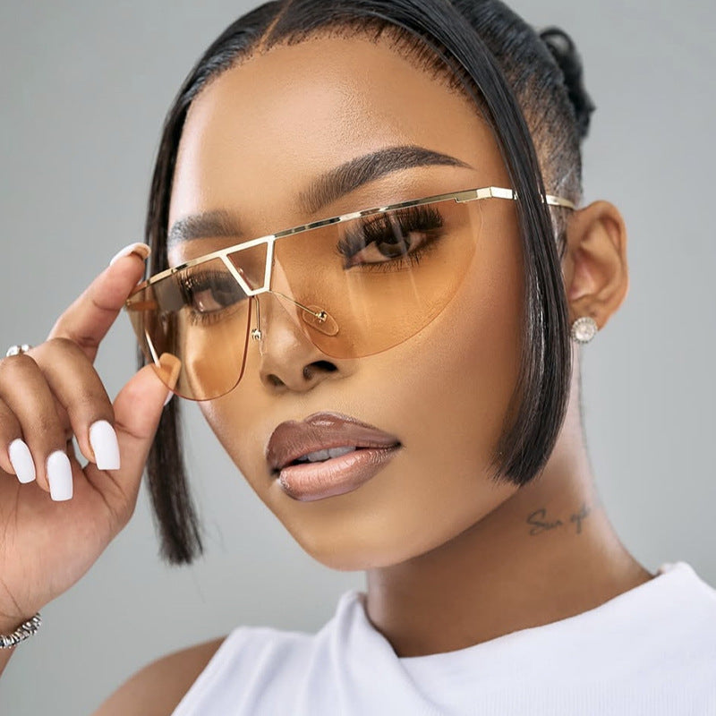 Damen futuristische Sonnenbrille mit schützendem Metallrahmen Brehn