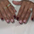 Kunstvolle Nagelkunst mit elegantem Polka-Dot Design Brehn