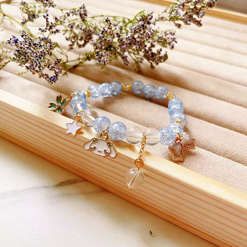 Elegantes Armband mit Tier- und Glitzeranhängern Brehn