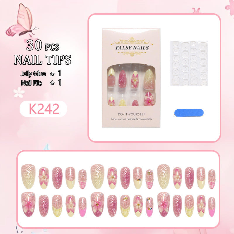 Kunstnagelset mit floralen 3D-Verzierungen Brehn