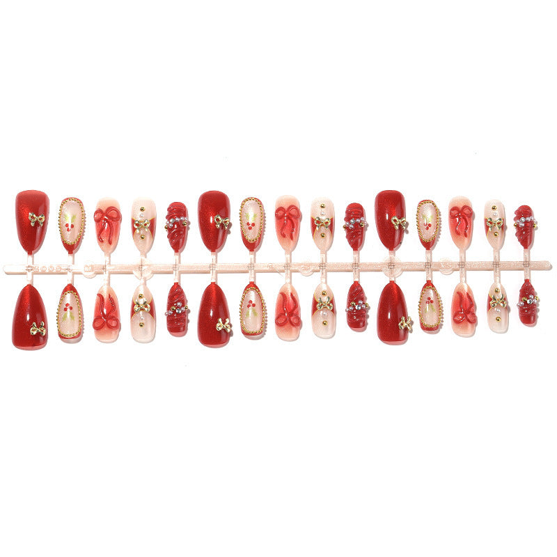 Kunstnagelset mit glamourösen Schleifen und funkelnden Details Brehn