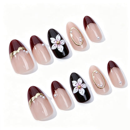 Kunstnagelset mit eleganten Blüten- und Glitzerdetails Brehn