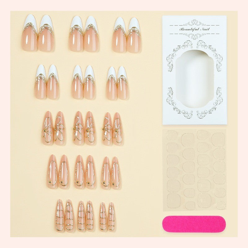 Kunstnagelset mit filigranen Goldakzenten Brehn