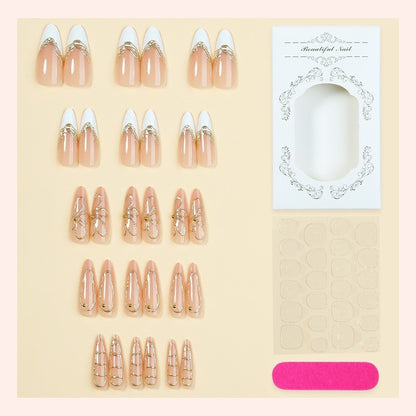 Kunstnagelset mit filigranen Goldakzenten Brehn