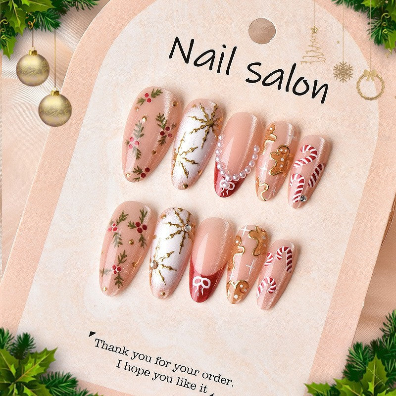 Kunstnagelset mit eleganten Weihnachtsmotiven und Glitzerakzenten Brehn
