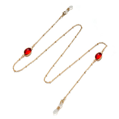 Eleganter mit Edelsteinen verzierter Brillenhalter Brehn