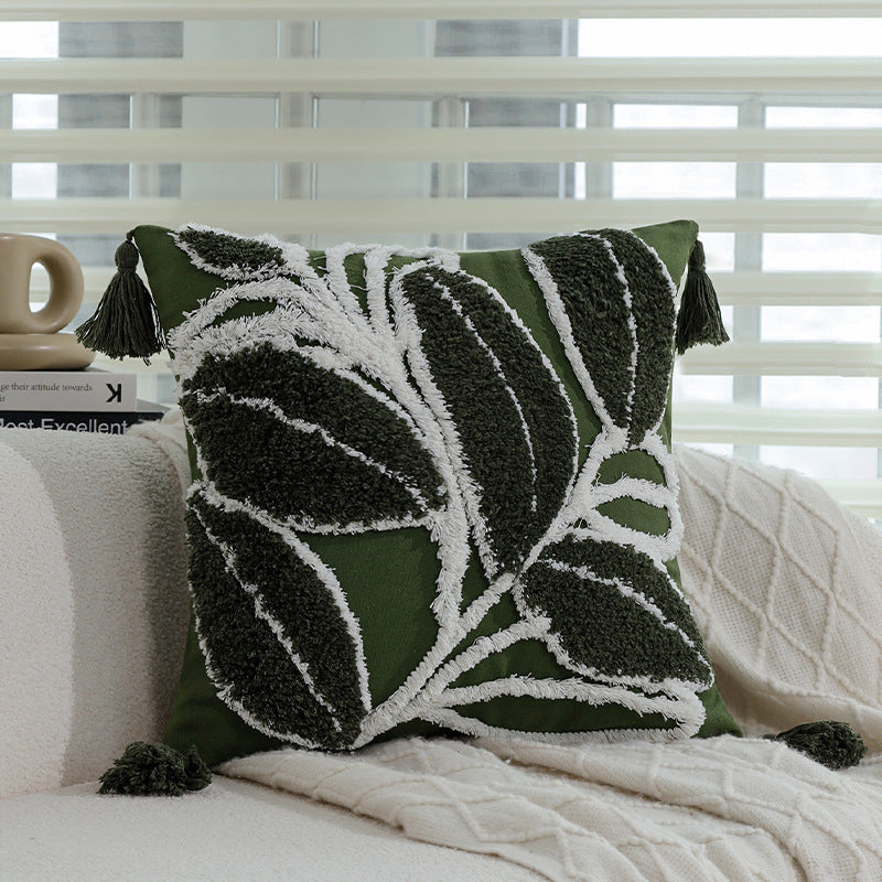 Quadratisches Zierkissen mit erhabenem Blatt‑Tufting und Quasten Brehn