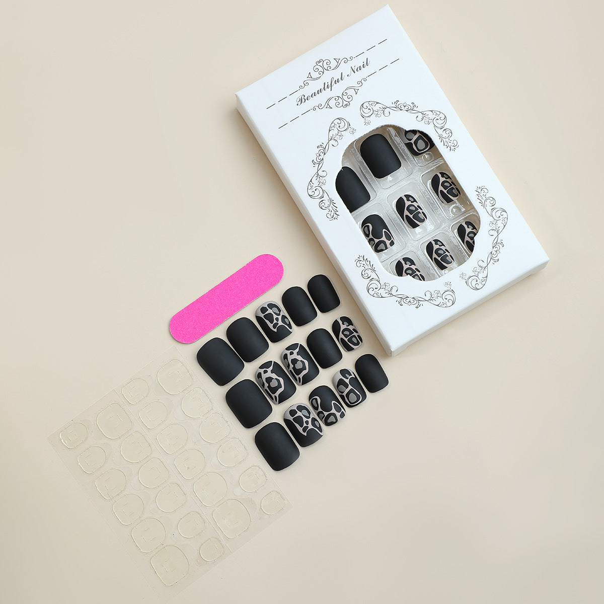 Künstlerisches Press-On Nagelset mit eleganten Designelementen Brehn