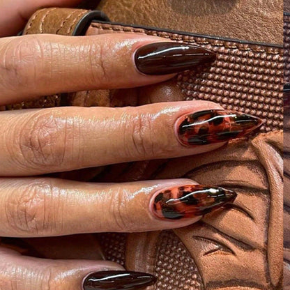 Kunstnägel mit elegantem Leoparden- und Glitzer-Design Brehn