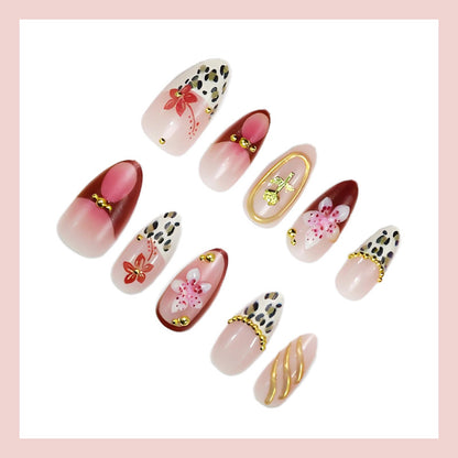 Kunstnagelset mit eleganten floralen und tierischen Akzenten Brehn