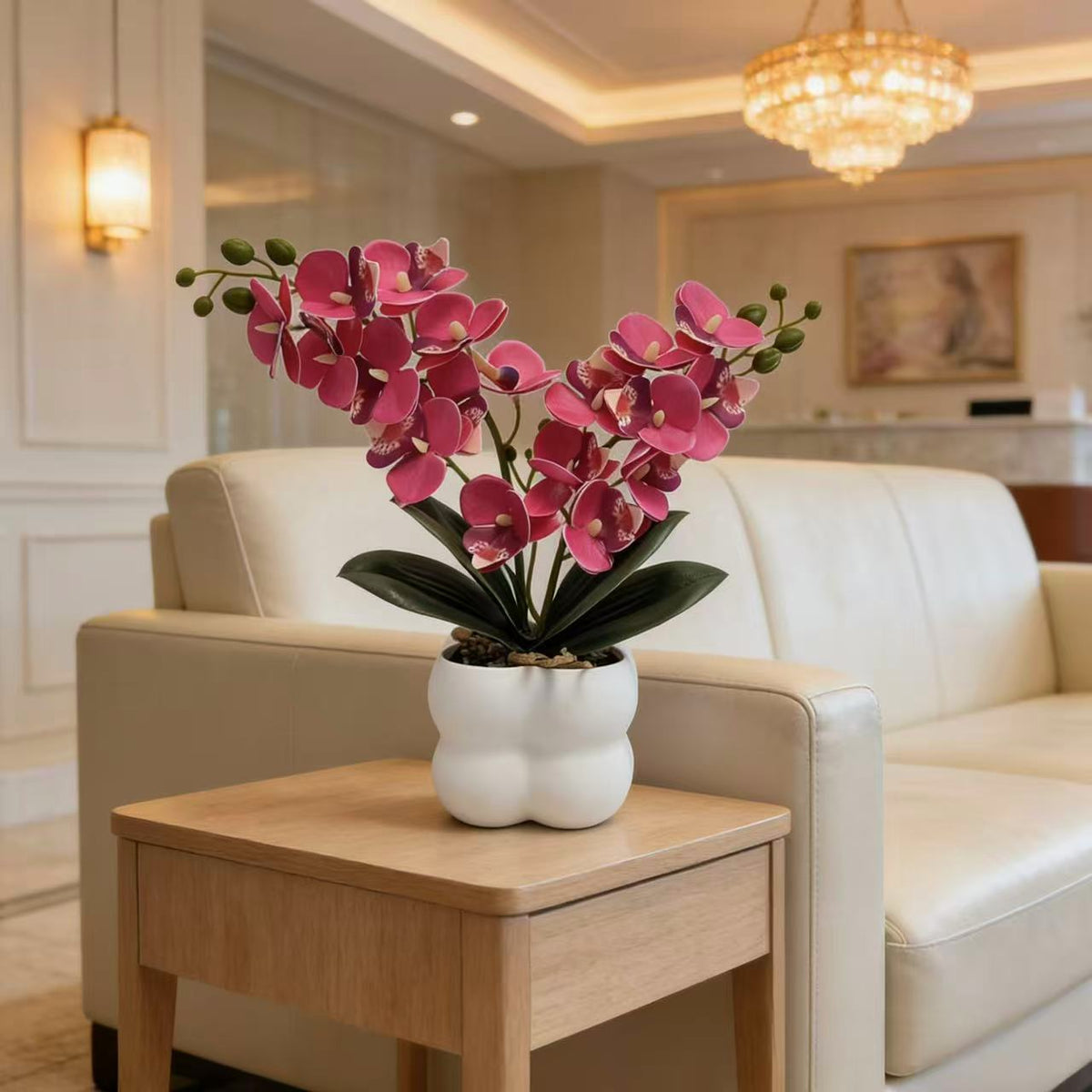 Lebensechte Orchideen Tischmittelstück