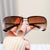 Damen Sonnenbrille mit großen, eleganten Gläsern und einem modernen Metallrahmen Brehn