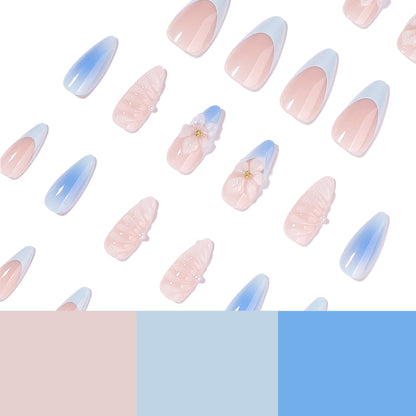 Stiletto-Nägel mit floralem Design und Glitzer Akzenten Brehn
