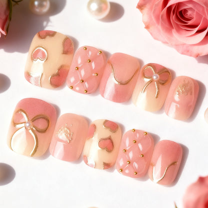 Elegantes Herz- und Band-Thema Press-On Nagelset Brehn