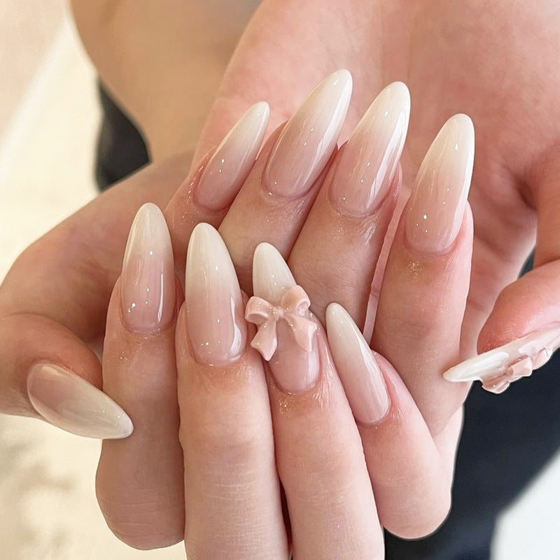 Elegantes Press-On Nail Art Set mit glänzender Oberfläche und süßen Schleifendetails Brehn